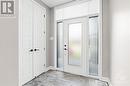 Tiled front foyer w/ double closet. - 68 Hubble Heights, Ottawa, ON  - Indoor Photo Showing Other Room 