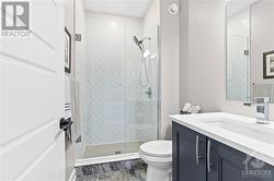 Main level 3 piece bath across from office/bedroom space! Very rare! - 