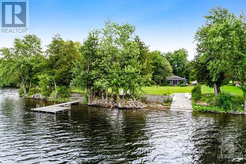 Easy access to 185' clear waterfront with dock and concrete boat launch - 3108 Beckwith 9Th Line, Carleton Place, ON - Outdoor With Body Of Water