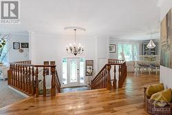 Grand sweeping foyer welcomes you home - 