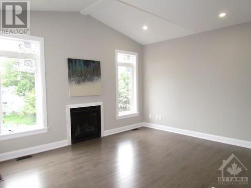 55 Cockburn Street, Ottawa, ON - Indoor Photo Showing Other Room With Fireplace