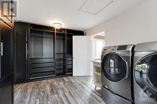 Walk-in closet with laundry - 1608 Nolans Road, Montague, ON - Indoor Photo Showing Laundry Room