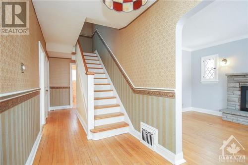 1335 Kitchener Avenue, Ottawa, ON - Indoor Photo Showing Other Room With Fireplace