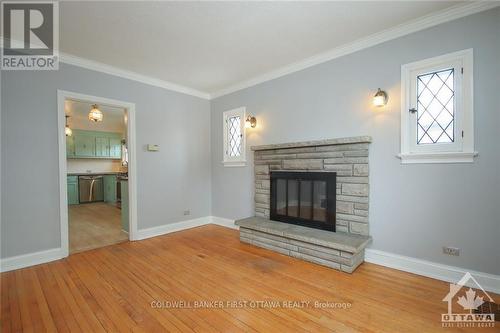 1335 Kitchener Avenue, Ottawa, ON - Indoor Photo Showing Living Room With Fireplace