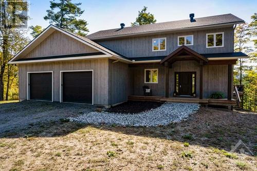 New 2021 contemporary home on 8 woodland acres in prestigious Barrett Chute neighbourhood along shores of Madawaska River - 1074 Barrett Chute Road, Calabogie, ON - Outdoor