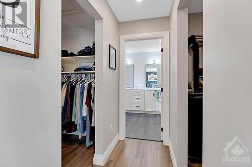 Two walk-in closets with interior lighting - 1074 Barrett Chute Road, Calabogie, ON - Indoor