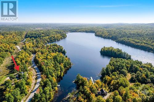 Deeded access to two gated waterfronts and nature trails for hiking - 1074 Barrett Chute Road, Calabogie, ON - Outdoor With Body Of Water With View