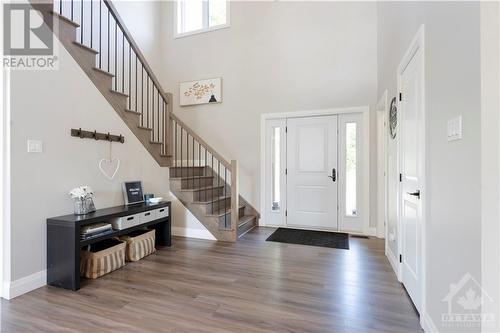 Welcoming white bright foyer with cathedral ceiling - 1074 Barrett Chute Road, Calabogie, ON - Indoor Photo Showing Other Room