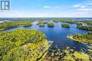 Home has 700' on Benson Lake where you can boat to Rideauy Canal - 161 A Taggart Lane, Westport, ON  - Outdoor With Body Of Water With View 