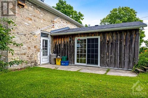 Family room addition with patio doors - 2931 Drummond Concession 7 Road, Perth, ON - Outdoor