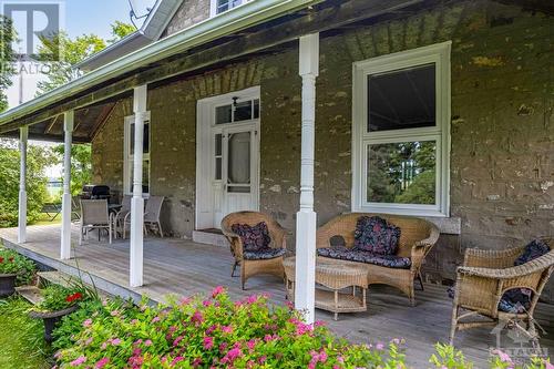 Classic full front covered verandah - 2931 Drummond Concession 7 Road, Perth, ON - Outdoor With Deck Patio Veranda