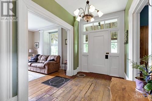 Grand front entry with pine floor. Main floor 9' ceilings - 2931 Drummond Concession 7 Road, Perth, ON - Indoor