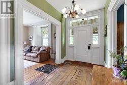 Grand front entry with pine floor. Main floor 9' ceilings - 