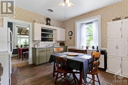 Country kitchen with room for family gatherings around kitchen table - 2931 Drummond Concession 7 Road, Perth, ON - Indoor Photo Showing Dining Room