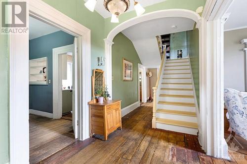 Home has central staircase with charming archway - 2931 Drummond Concession 7 Road, Perth, ON 