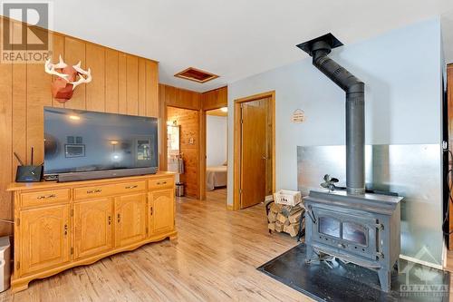 447 Hardwood Ridge Road, Lanark Highlands, ON - Indoor With Fireplace