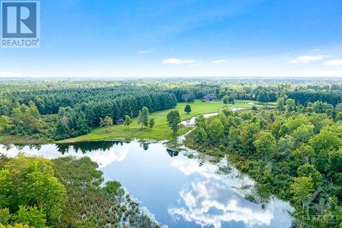 On the Tay River where you can enjoy canoeing, kayaking and tubing - 2499 Bathurst Concession 2 Road, Perth, ON - Outdoor With View