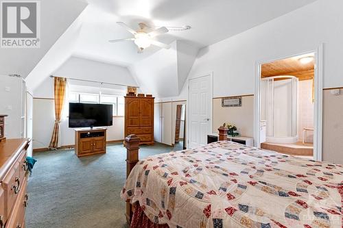 Upstairs' primary bedroom - 2499 Bathurst Concession 2 Road, Perth, ON - Indoor Photo Showing Bedroom