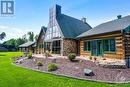 Rear view of home with its solarium's soaring glass wall - 2499 Bathurst Concession 2 Road, Perth, ON  - Outdoor 