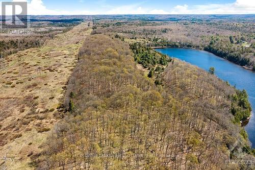 1084C Swaugers Lake Road, North Frontenac (Frontenac North), ON - Outdoor With Body Of Water With View