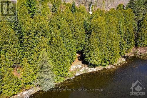 1084C Swaugers Lake Road, North Frontenac (Frontenac North), ON - Outdoor With Body Of Water