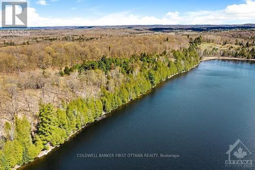 1084C Swaugers Lake Road, North Frontenac (Frontenac North), ON - Outdoor With Body Of Water With View