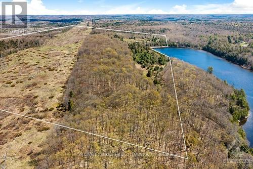 1084C Swaugers Lake Road, North Frontenac (Frontenac North), ON - Outdoor With Body Of Water With View