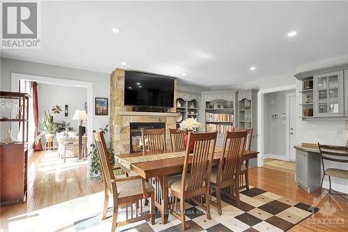 6068 James Bell Drive, Ottawa, ON - Indoor Photo Showing Dining Room With Fireplace