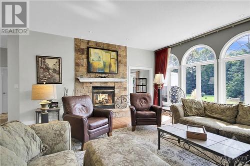 6068 James Bell Drive, Ottawa, ON - Indoor Photo Showing Living Room With Fireplace