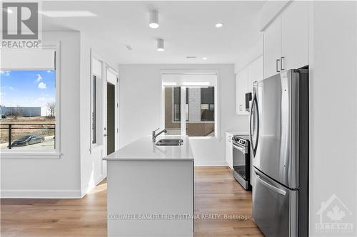 103 - 611 Wanaki Road, Ottawa, ON - Indoor Photo Showing Kitchen With Double Sink