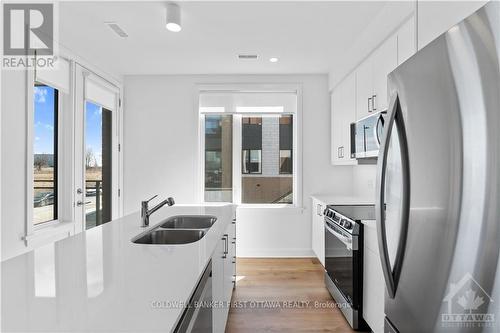 103 - 611 Wanaki Road, Ottawa, ON - Indoor Photo Showing Kitchen With Double Sink