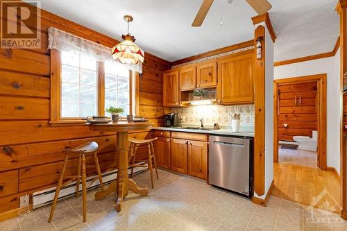 Tiffany lamp over sitting nook - 1102 Ebbs Bay Road, Carleton Place, ON - Indoor Photo Showing Kitchen