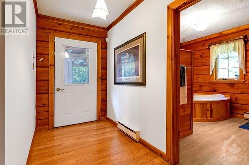 Rear foyer opens to wrap-about deck - 1102 Ebbs Bay Road, Carleton Place, ON - Indoor Photo Showing Other Room