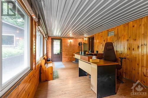 Lower level sunroom with office - 1102 Ebbs Bay Road, Carleton Place, ON - Indoor Photo Showing Other Room