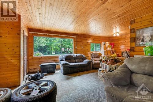 Interior of studio, that also has woodstove - 1102 Ebbs Bay Road, Carleton Place, ON - Indoor Photo Showing Living Room