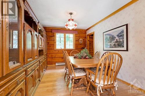 Dining room beautiful, hand-crafted French oak wall unit known as a 'schrank' - 1102 Ebbs Bay Road, Carleton Place, ON - Indoor Photo Showing Dining Room