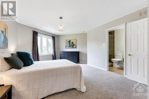 Second bedroom with 3-pc ensuite - 5525 Pettapiece Crescent, Manotick, ON - Indoor Photo Showing Bedroom