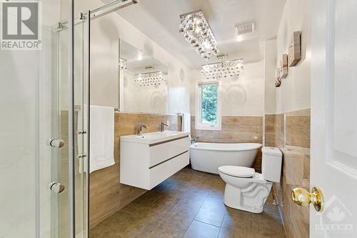 Second floor bathroom   a design of quality, including 2-sink vanity. - 5525 Pettapiece Crescent, Manotick, ON - Indoor Photo Showing Bathroom