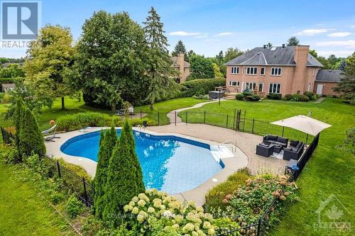 5525 Pettapiece Crescent, Ottawa, ON - Outdoor With In Ground Pool With Backyard