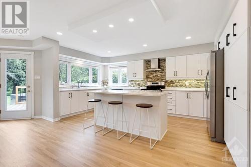 Upscale contemporary quartz kitchen with new 2024 appliances. - 5525 Pettapiece Crescent, Manotick, ON - Indoor Photo Showing Kitchen With Upgraded Kitchen