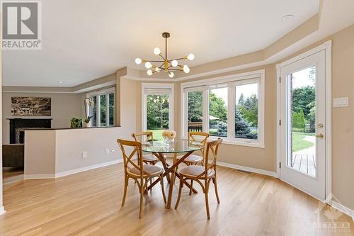 Kitchen dinette area has glass door to deck - 5525 Pettapiece Crescent, Manotick, ON - Indoor Photo Showing Dining Room