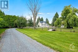 Driveway leads to quiet picturesque setting for country estate - 