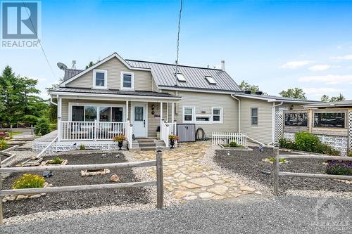 Charming verandah welcomes you home - 2344 Mclachlin Road, Beckwith (910 - Beckwith Twp), ON - Outdoor With Deck Patio Veranda With Facade