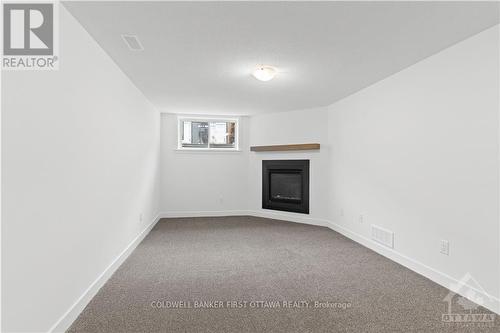 519 Corretto Place, Ottawa, ON - Indoor Photo Showing Other Room With Fireplace