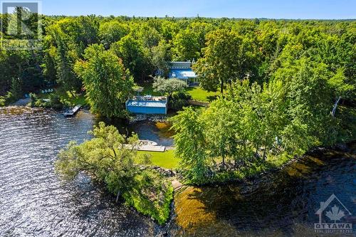 On Ottawa River, elegant home has 1.7 acres with boathouse and private inlet harbour - 150 Dewolfe Street, Ottawa, ON - Outdoor With View