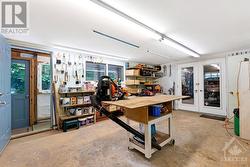 Interior of attached garage's workshop - 