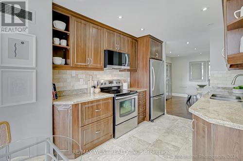 1705 - 7420 Bathurst Street, Vaughan, ON - Indoor Photo Showing Kitchen With Double Sink