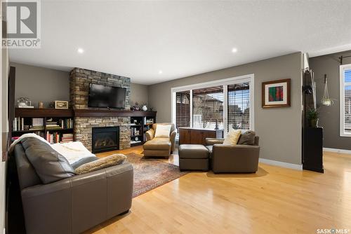 3809 Goldfinch Way, Regina, SK - Indoor Photo Showing Living Room With Fireplace