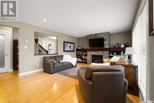 3809 Goldfinch Way, Regina, SK - Indoor Photo Showing Living Room With Fireplace