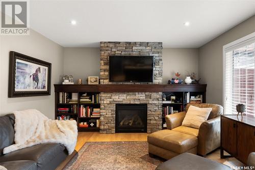 3809 Goldfinch Way, Regina, SK - Indoor Photo Showing Living Room With Fireplace